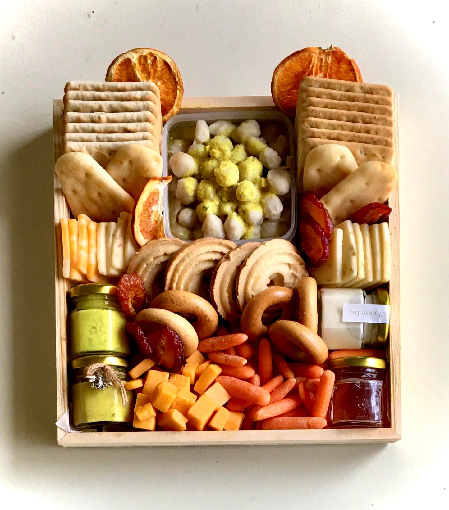 Vegetarian Charcuterie Board Fully Assorted with crackers, naan, cheddar cheese, and dips (Large Board 18x14)