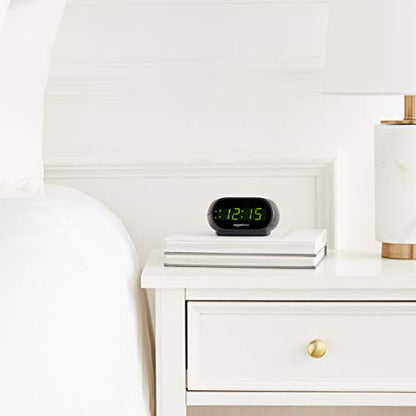 Amazon Basics Small Digital Oval Alarm Clock With LED Display, Nightlight & Battery Backup, Black, 4.5 x 3.5 x 2.4 Inches