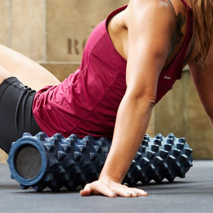 RumbleRoller - Extra Firm Textured Muscle Foam Roller Manipulates Soft Tissue Like A Massage Therapist (Black, Mid Size)