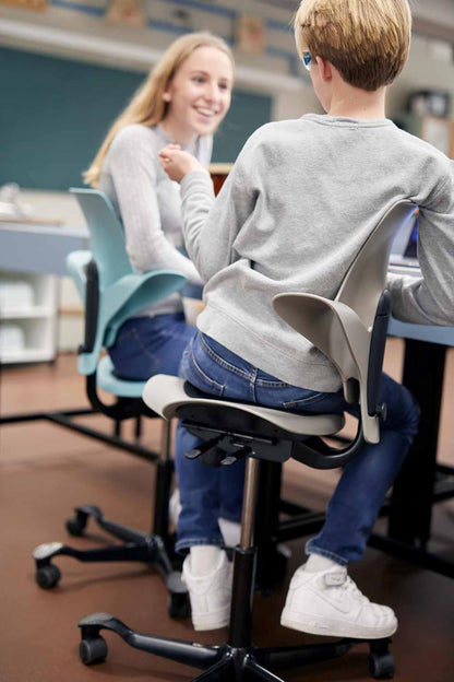 HAG Capisco Puls Adjustable Sit to Stand Desk Chair-White Frame-Blue Plastic-Blue Partial Cushion with Footring