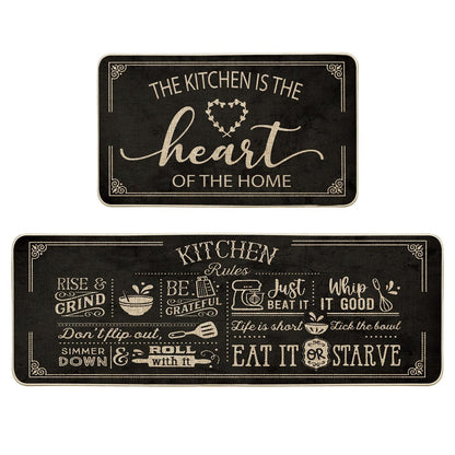 Artoid Mode Black Cooking Sets Kitchen Mats Set of 2, Seasonal The Kitchen is The Heart of The Home Holiday Party Low-Profile Floor Mat for Home Kitchen - 17x29 and 17x47 Inch