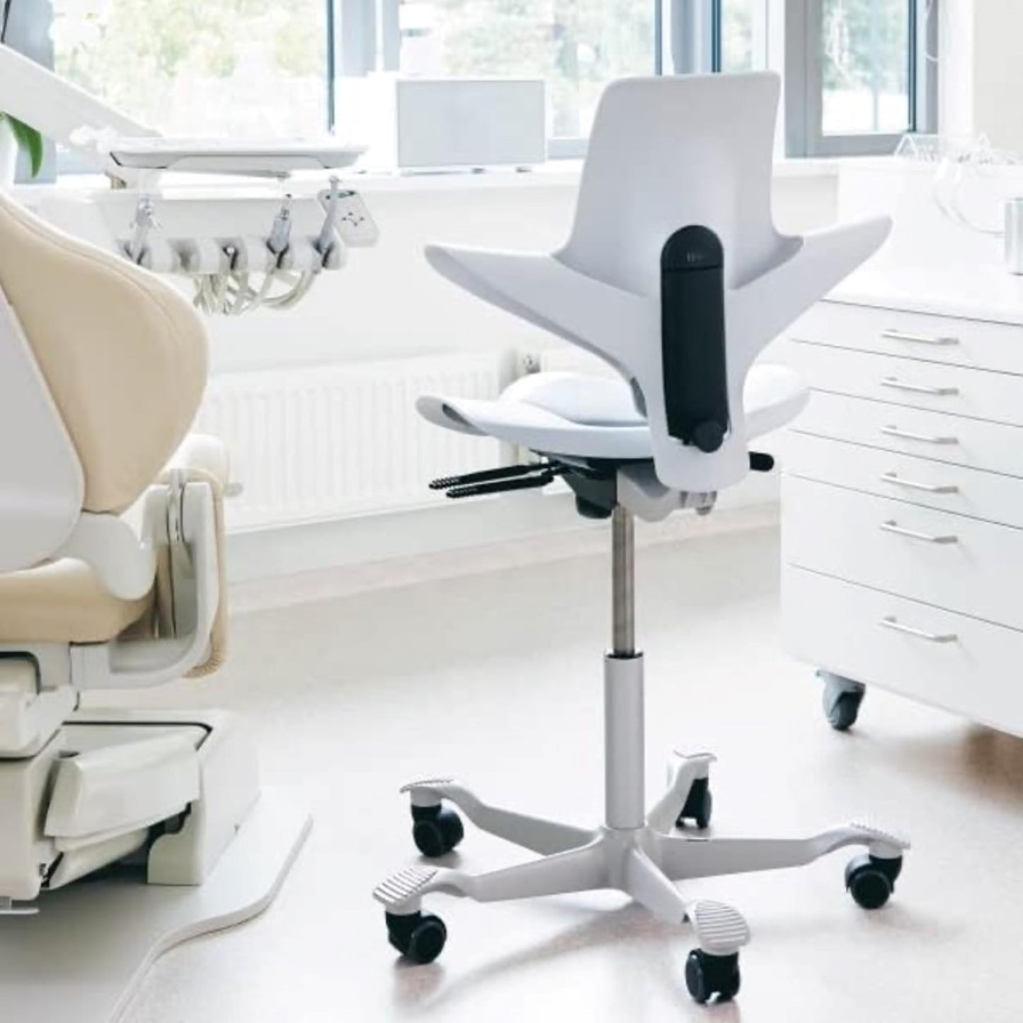 HAG Capisco Puls Adjustable Sit to Stand Desk Chair-White Frame-Blue Plastic-Blue Partial Cushion with Footring