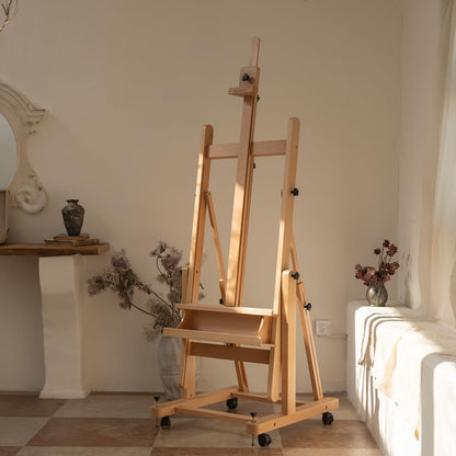 MEEDEN Enlarged Heavy-Duty H-Frame Easel: Artist Solid Beech Wooden Studio Easel - Professional Painting Art Easel Stand with 4 Lockable Wheels & Leveling Bolts - Hold Canvas up to 86" H