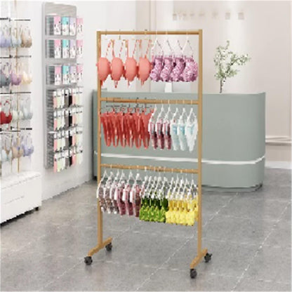 Metal Lingerie Bra Rack Swimsuit Organizer Hanger, Anti-Slip, Underwear Mobile Display Stand with Wheels, Commercial Clothing Store Shelf, for Shorts,Hats, Sock, 3 Tier(Gold,120 * 40 * 135cm)