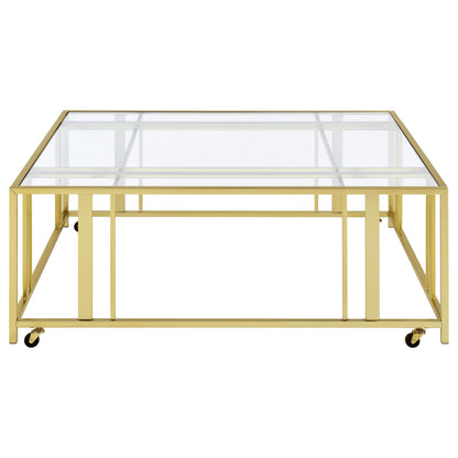 Coaster Home Furnishings - Adri - Square Glass Top Coffee Table with Geometric Base and Mobile with Rolling Casters - Contemporary - Living Room - Matte Brass - 710188