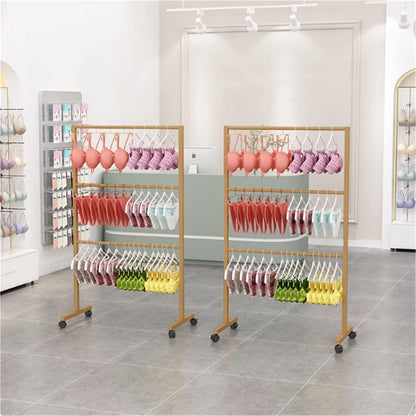 Metal Lingerie Bra Rack Swimsuit Organizer Hanger, Anti-Slip, Underwear Mobile Display Stand with Wheels, Commercial Clothing Store Shelf, for Shorts,Hats, Sock, 3 Tier(Gold,120 * 40 * 135cm)