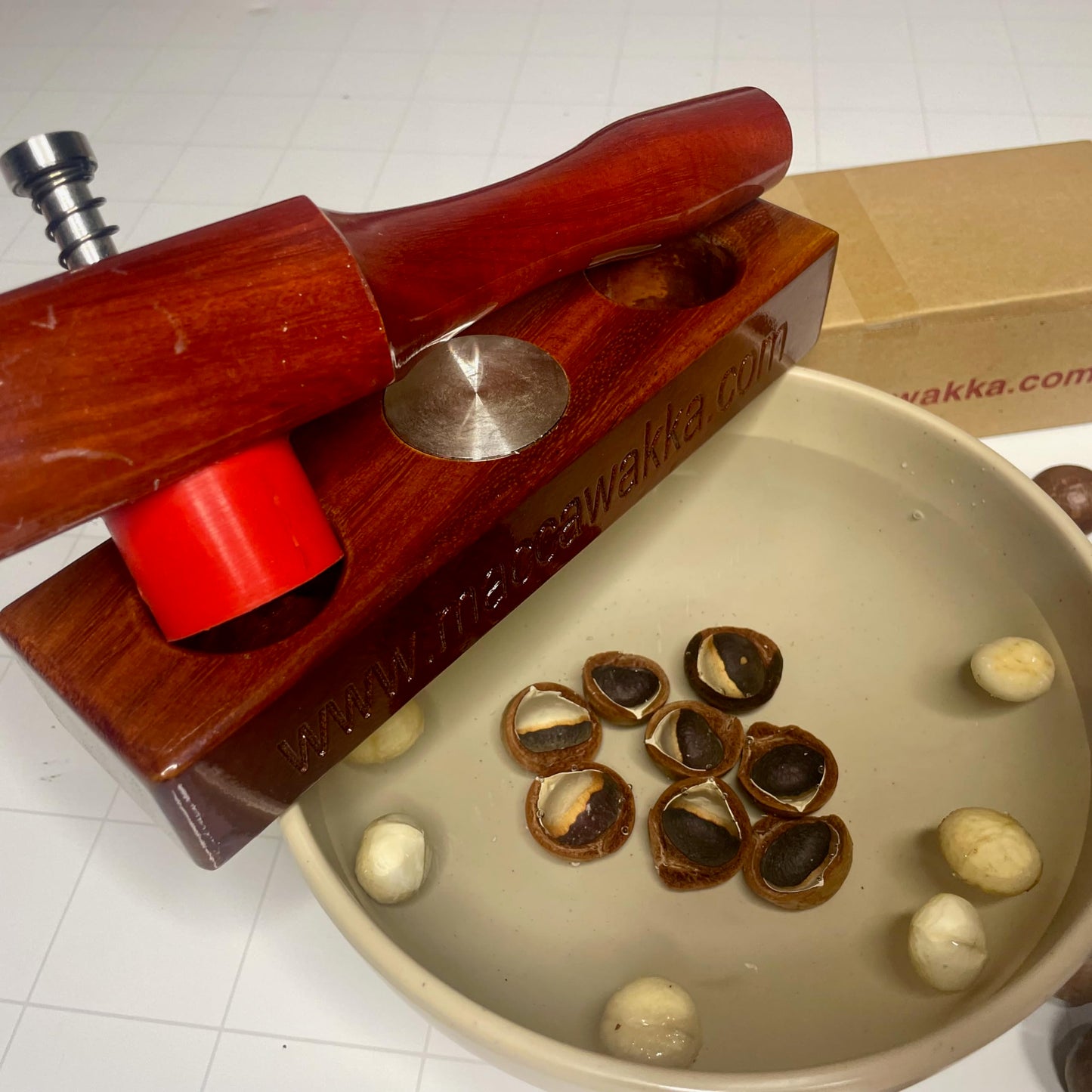 Nut Cracker, kitchen tool - Eat Fresh Cracked Macadamia nuts with your New Maccawakka Nut cracking tool