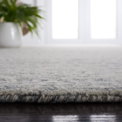 SAFAVIEH Area Rug 6x9 - Metro Collection - Dark Grey & Ivory, Handmade Wool, Ideal for Living Room, Bedroom, Dining Space (MET998H)