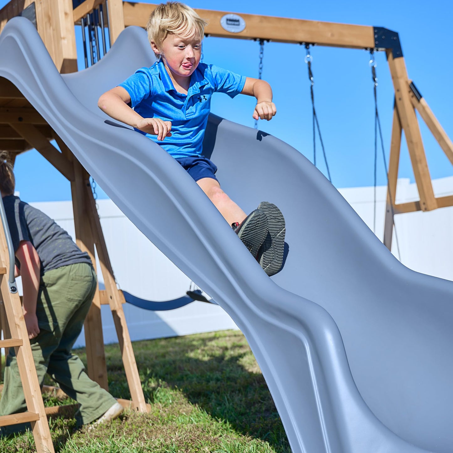 Backyard Discovery Dover Bay Spruce Wood Swing Set with Wave Slide, Clubhouse, Monkey Bars, Rock Wall, Belt Swings, Step Ladder, Toy Telescope, Chalkboard, Outdoor Playset