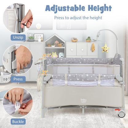 BABY JOY 5-in-1 Pack and Play, Portable Baby Bedside Sleeper with Bassinet, U-Shaped Diaper Changer, Safety Strap, Side Zipper Entrance, Hangings, Bedside Crib Playard from Newborn to Toddlers (Beige)