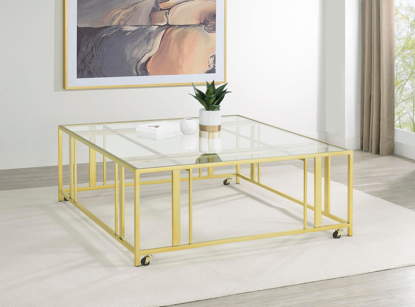 Coaster Home Furnishings - Adri - Square Glass Top Coffee Table with Geometric Base and Mobile with Rolling Casters - Contemporary - Living Room - Matte Brass - 710188