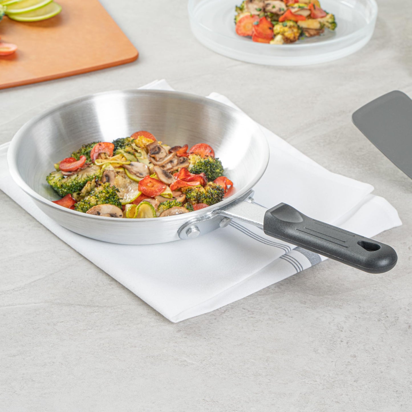 Restaurantware Silicone Hot Handle Holder - Met Lux Heat Resistant Fry Pan Sleeve, Dishwasher Safe - Non-Slip Pat Holder Sleeve Fits 8 inch & 9 inch Aluminum Pans, Black