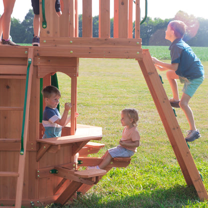 Backyard Discovery Woodland Cedar Wood Swing Set with Wave Slide, Clubhouse, Rock Wall, Snack Bar Station, Benches, Belt Swings, Trapeze, Half Door, Balcony, Step Ladder, Outdoor Playset