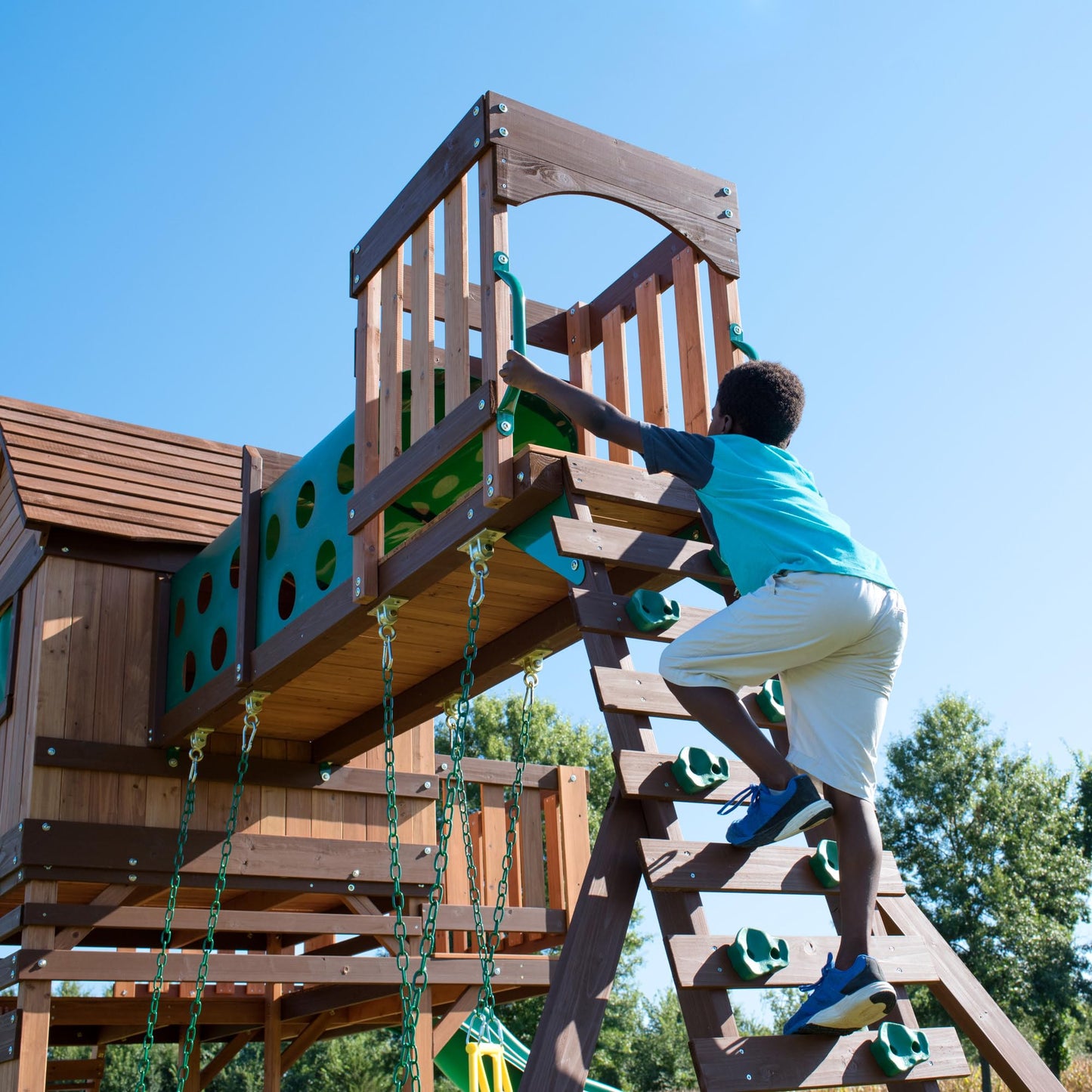 Backyard Discovery Woodridge Elite Cedar Wood Swing Set with Wave Slide, Clubhouse, Crawl Tunnel, Crow's Nest, Belt Swings, Trapeze, Rock Wall Ladder, Sandbox, Wrap-Around Porch, Deck, Outdoor Playset