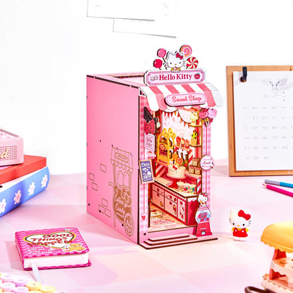 Hands Craft Hello Kitty Sweet Shop Book Nook Kit – Official Sanrio DIY Miniature Shelf Insert with Touch LED – 149-Piece 3D Puzzle for Adults & Teens – Kawaii Decor, Collectible Diorama Craft Kit
