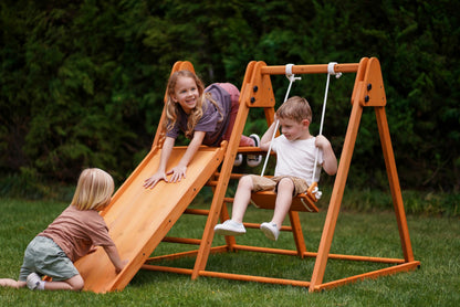 Avenlur 4-in-1 Juniper Outdoor Play Gym - Jungle Gym Playset with Baby Swing, Slide, Ladder, and Climbing Wall - Foldable Wooden Playset - Outdoor Jungle Gym for Kids Ages 18mo to 6yrs