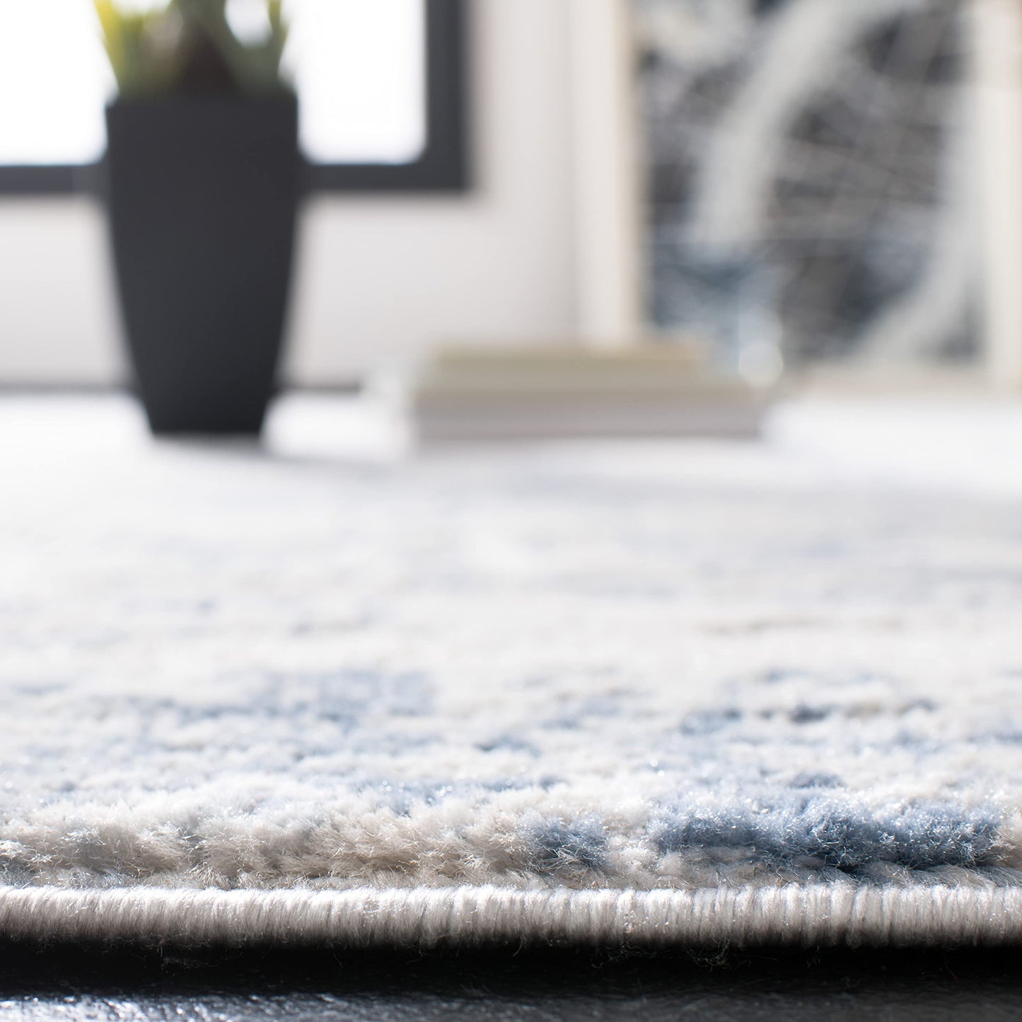 SAFAVIEH Amelia Collection Area Rug - 10' x 14', Ivory & Blue, Modern Abstract Design, Non-Shedding & Easy Care, Ideal for High Traffic Areas in Living Room, Bedroom (ALA700A)
