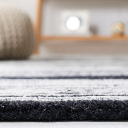 SAFAVIEH Metro Collection 8' x 10' IvoryBlack MET995B Handmade Premium Wool Living Room Dining Bedroom Area Rug