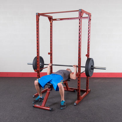 Body-Solid Best Fitness Power Rack - 14-Gauge Steel Home Gym with 500lb Capacity, Chin Bar, 23 Adjustable Safety Bars, Optional LAT & Dip Attachments, Red