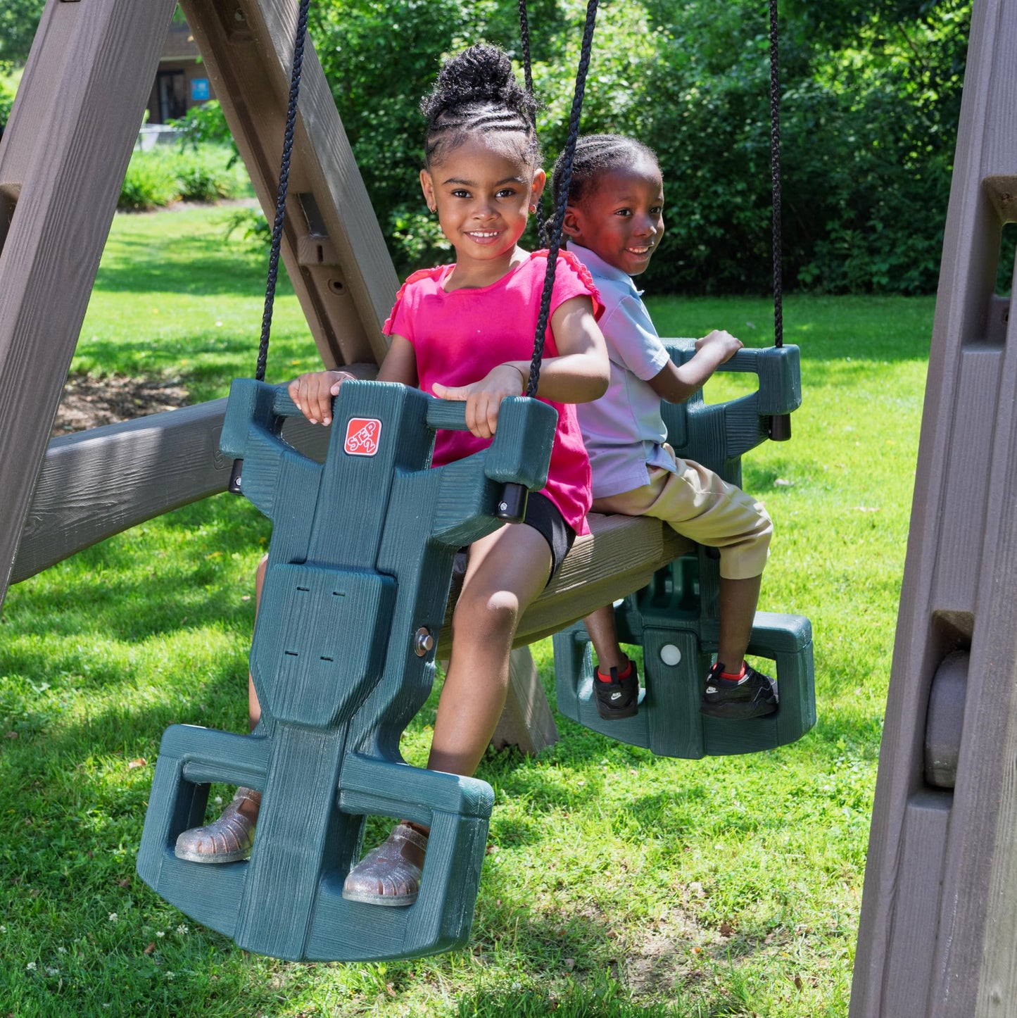Step2 Naturally Playful Adventure Lodge Play Center with Glider, Kids Outdoor Playset, Two Tier Backyard Playground Set, Slide, Swings, Rope Ladder, Basketball Hoop, Jungle Gym, Children 3-8 Years Old