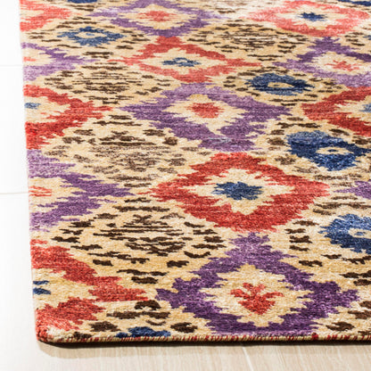 SAFAVIEH Luxor Collection Area Rug - 6' x 9', Purple & Rust, Handmade Ikat Design Banana Silk, Ideal for High Traffic Areas in Living Room, Bedroom (LUX161A)