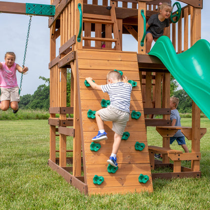 Backyard Discovery Highlander Cedar Wood Swing Set with Wave Slide, Three-Story Clubhouse, Rock Wall, Picnic Table, Belt Swings, Web Swing, Sandbox, Three Ladders, Toy Accessories, Outdoor Playset