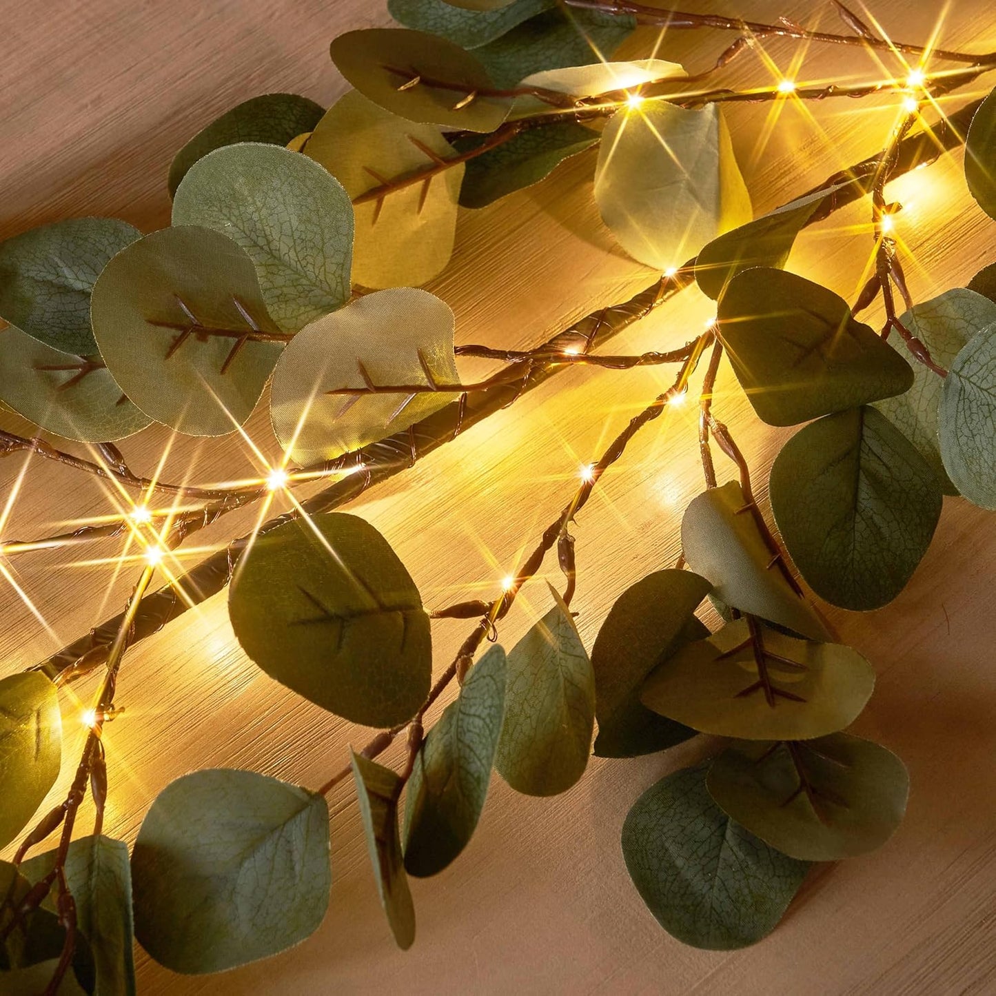 Hairui 6FT Lighted Artificial Eucalyptus Garland with 96 LED Battery Operated Faux Vine Lights and Timer for Decor
