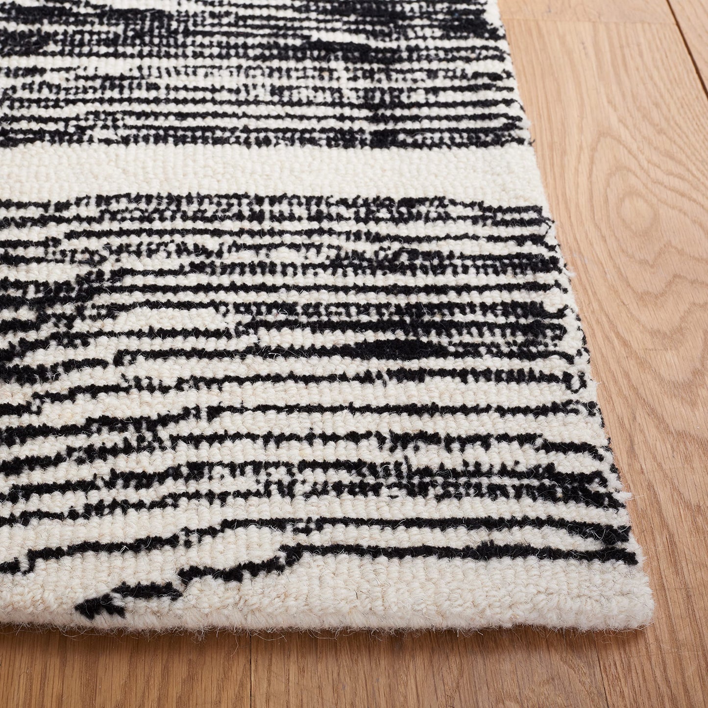 SAFAVIEH Area Rug 8x10 - Metro Collection - Large - Black & Ivory, Handmade Wool, Ideal for Living Room, Bedroom, Office, Dining Space (MET995Z)