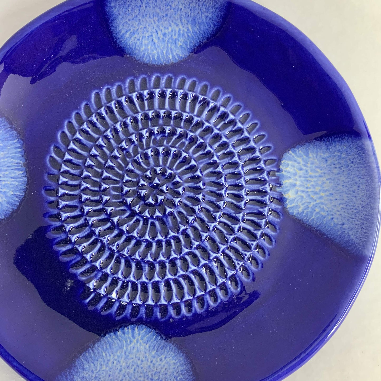 BonCera, All-in-one Premium Ceramic Garlic Grater Plate 4-Piece Set - Blue Cross Glazed Design and Style - For Garlic, Ginger, Chocolate, and more! - Comes with 5.25" Plate, Peeler, Brush, and Stand