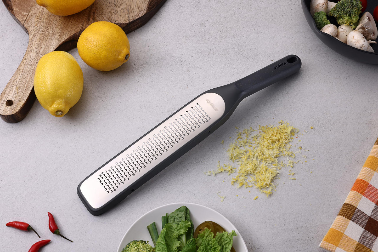 Zyliss Rasp Grater - Handheld Grater with Stainless Steel Blade & Wheat Straw Handle - Ideal for Hard Cheese, Chocolate, Ginger, & More - Protective Cover Doubles as Scraper