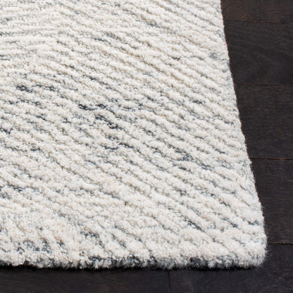SAFAVIEH Metro Collection Area Rug - 9' x 12', Dark Grey & Ivory, Handmade Wool, Ideal for High Traffic Areas in Living Room, Bedroom (MET999H)