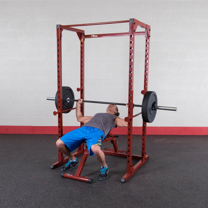 Body-Solid Best Fitness Power Rack - 14-Gauge Steel Home Gym with 500lb Capacity, Chin Bar, 23 Adjustable Safety Bars, Optional LAT & Dip Attachments, Red