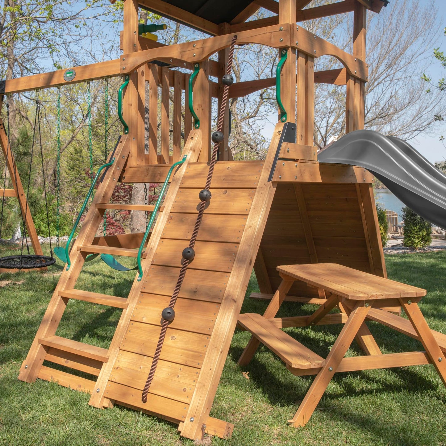Backyard Discovery Endeavor II Cedar Wood Swing Set with Wave Slide, Play Deck, Double Rock Wall, Picnic Table, Climbing Wall, Belt Swings, Web Swing, Toy Telescope, Step Ladder, Outdoor Playset