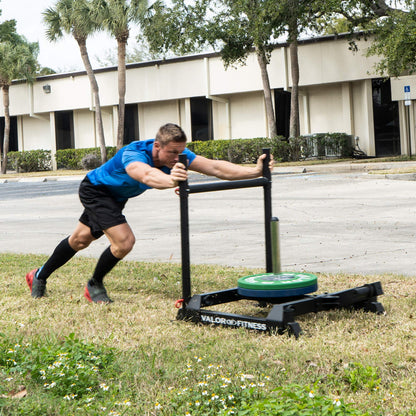 Valor Fitness Weighted Wheelbarrow Sled with Harness – Push, Pull, or Drag – Power Training Sled for Strength and Conditioning – 300 lb Capacity – Olympic Plate Storage – Home Gym Equipment