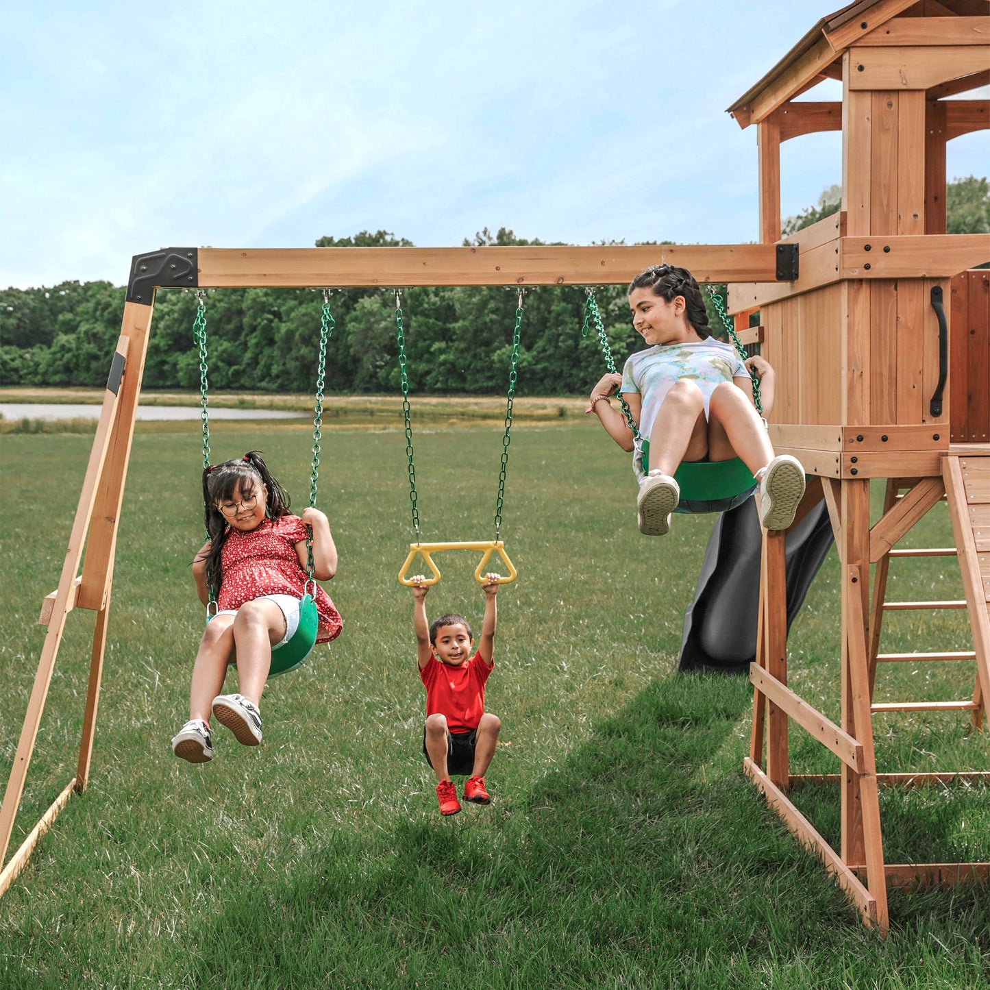 Backyard Discovery Sterling Point Cedar Wood Swing Set with Wave Slide, Raised Clubhouse, Wooden Bridge, Rock Wall, Belt Swings, Web Swing, Trapeze, Balcony, Climbing Wall, Ladder, Outdoor Playset