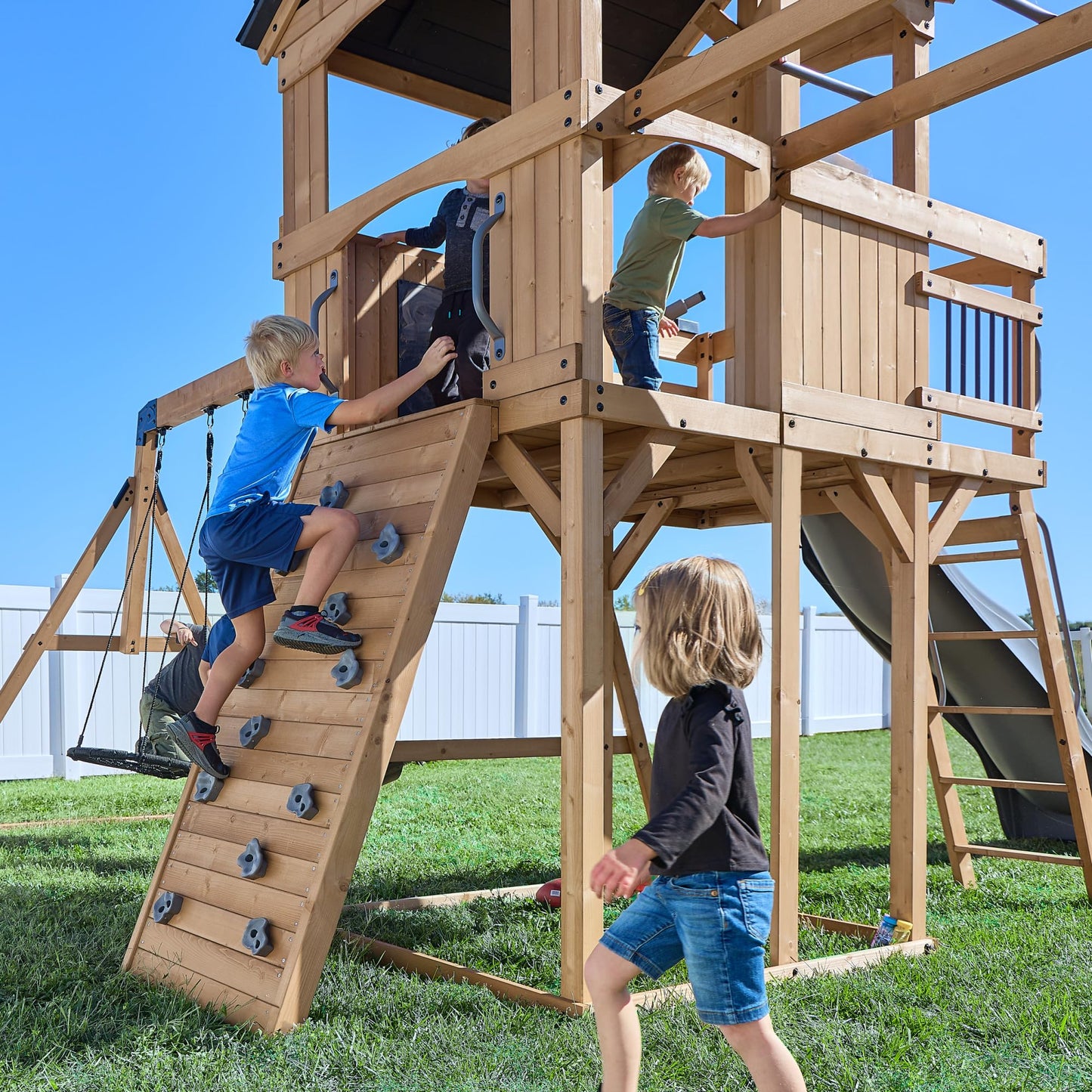 Backyard Discovery Dover Bay Spruce Wood Swing Set with Wave Slide, Clubhouse, Monkey Bars, Rock Wall, Belt Swings, Step Ladder, Toy Telescope, Chalkboard, Outdoor Playset