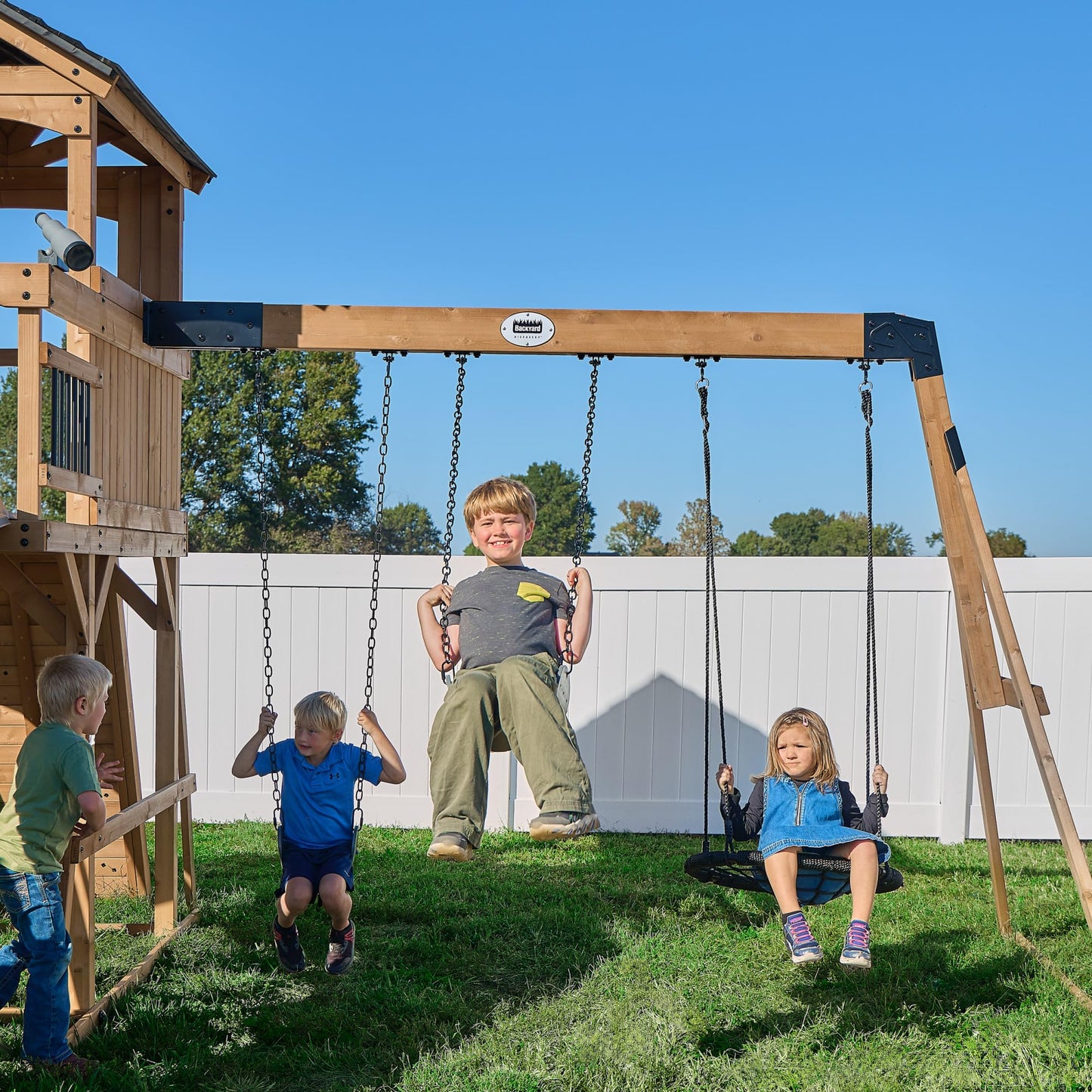 Backyard Discovery Dover Bay Spruce Wood Swing Set with Spiral Tube Slide, Wave Slide, Clubhouse, Rock Wall, Belt Swings, Step Ladder, Toy Telescope, Chalkboard, Outdoor Playset
