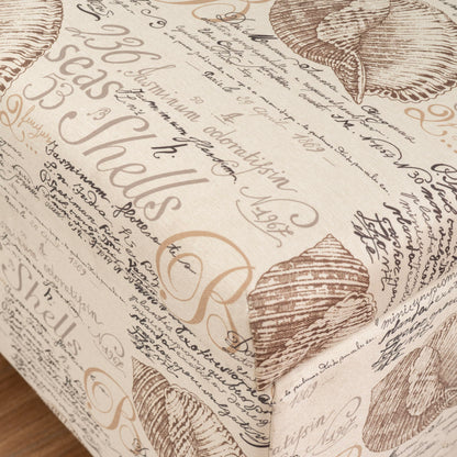 Linon Carmen Ivory and Beige Seashell Upholstered Lift Top Storage Ottoman with Wooden Feet