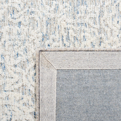 SAFAVIEH Area Rug 6x9 - Metro Collection - Light Blue & Ivory, Handmade Wool, Ideal for Living Room, Bedroom, Dining Space (MET998L)