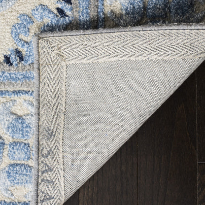 SAFAVIEH Bella Collection Area Rug - 7' Square, Ivory & Blue, Handmade Wool & Viscose, Ideal for High Traffic Areas in Living Room, Bedroom (BEL155A)