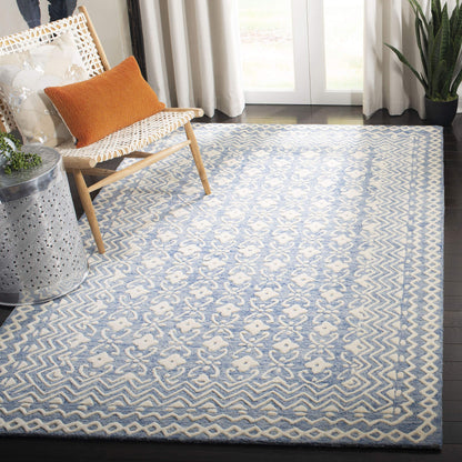 SAFAVIEH Blossom Collection Area Rug - 6' x 9', Blue & Ivory, Handmade Wool, Ideal for High Traffic Areas in Living Room, Bedroom (BLM114M)